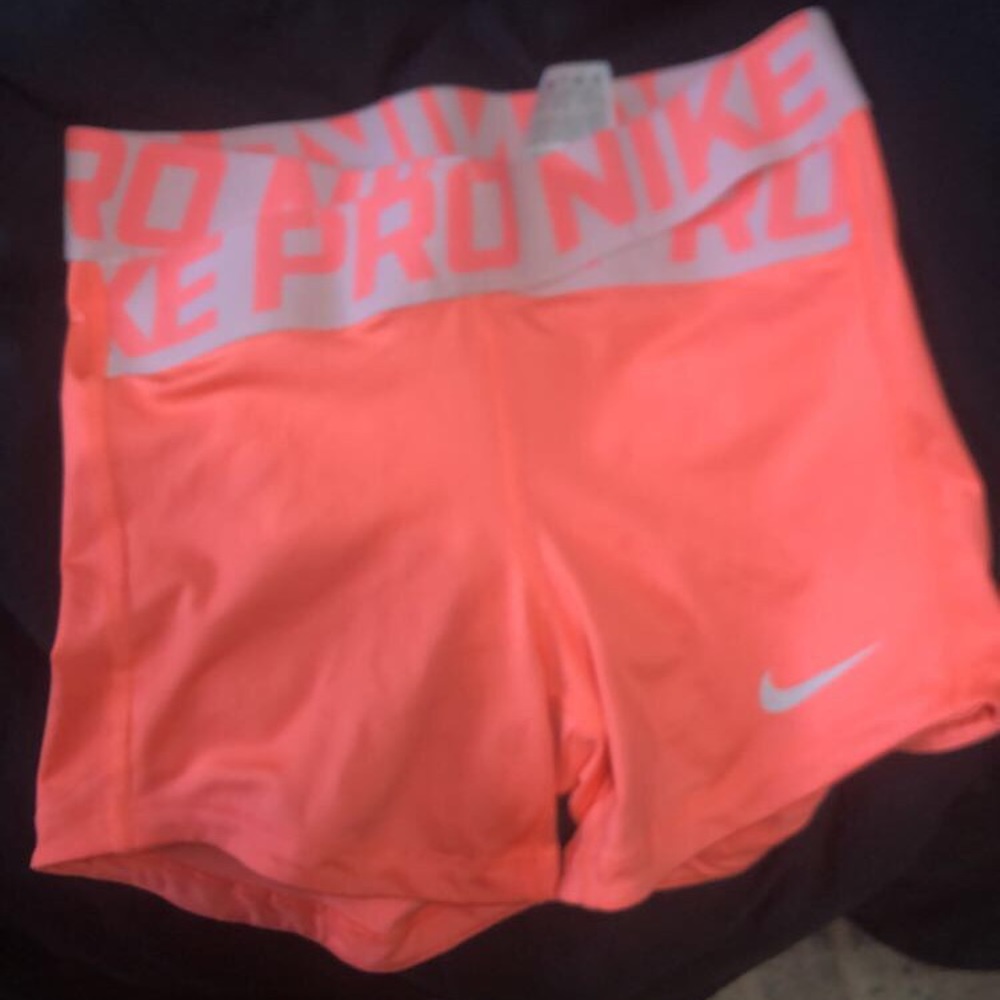 Nike pro intertwist shorts- coral pink- size small